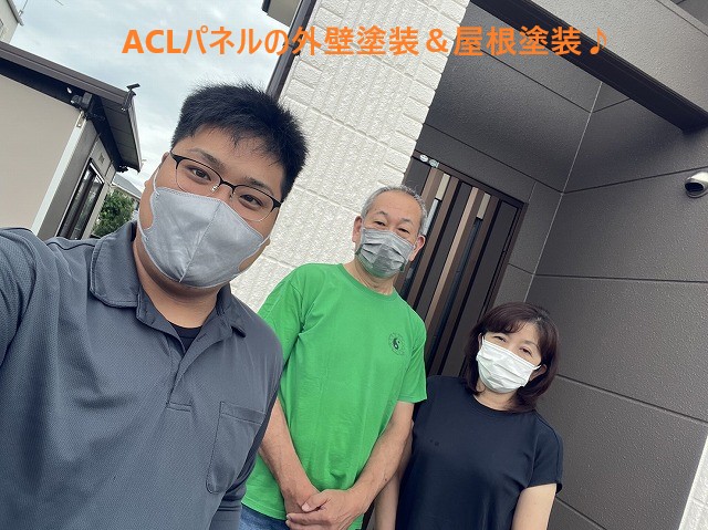 ACLパネル塗装のお客様とのツーショット写真